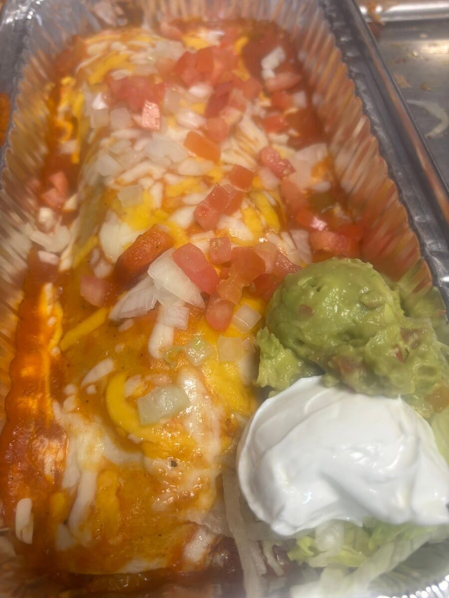 Catering-size burrito with all the garnishes