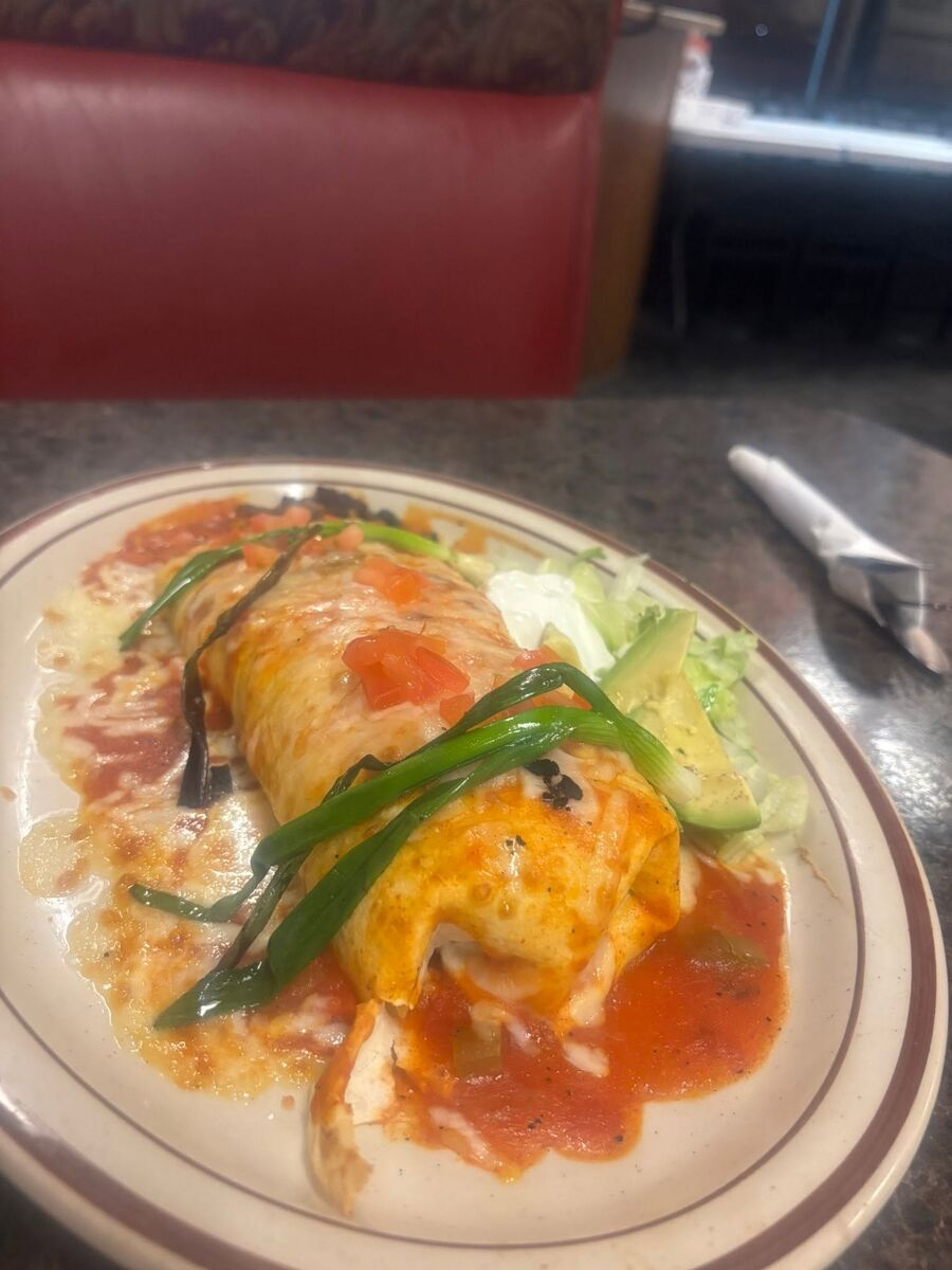 Chile relleno under ranchero sauce