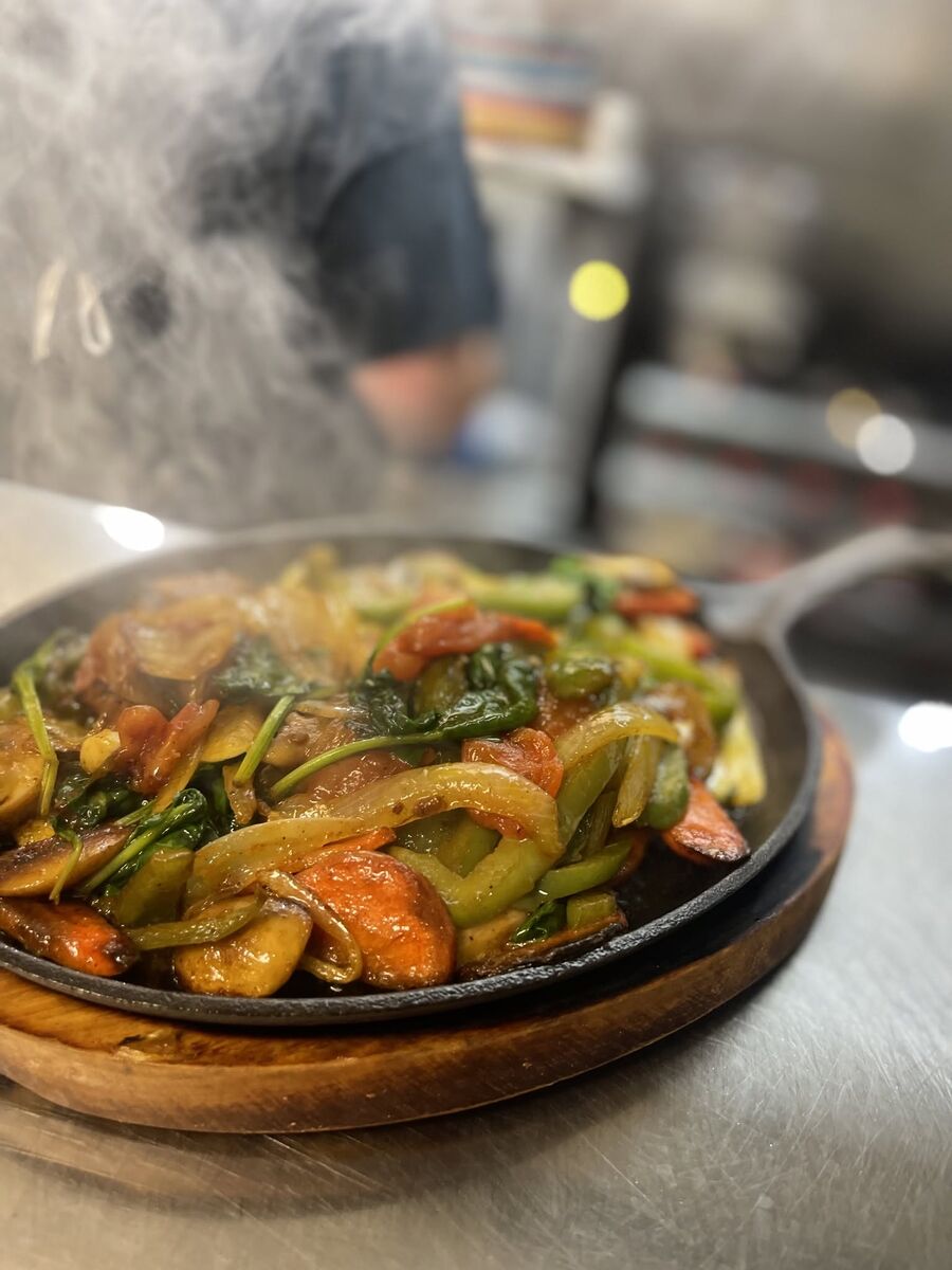 Sizzling fajitas straight off the skillet