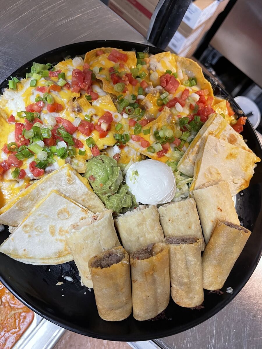 The Fiesta Grande Platter — nachos, quesadilla, taquitos and flautas