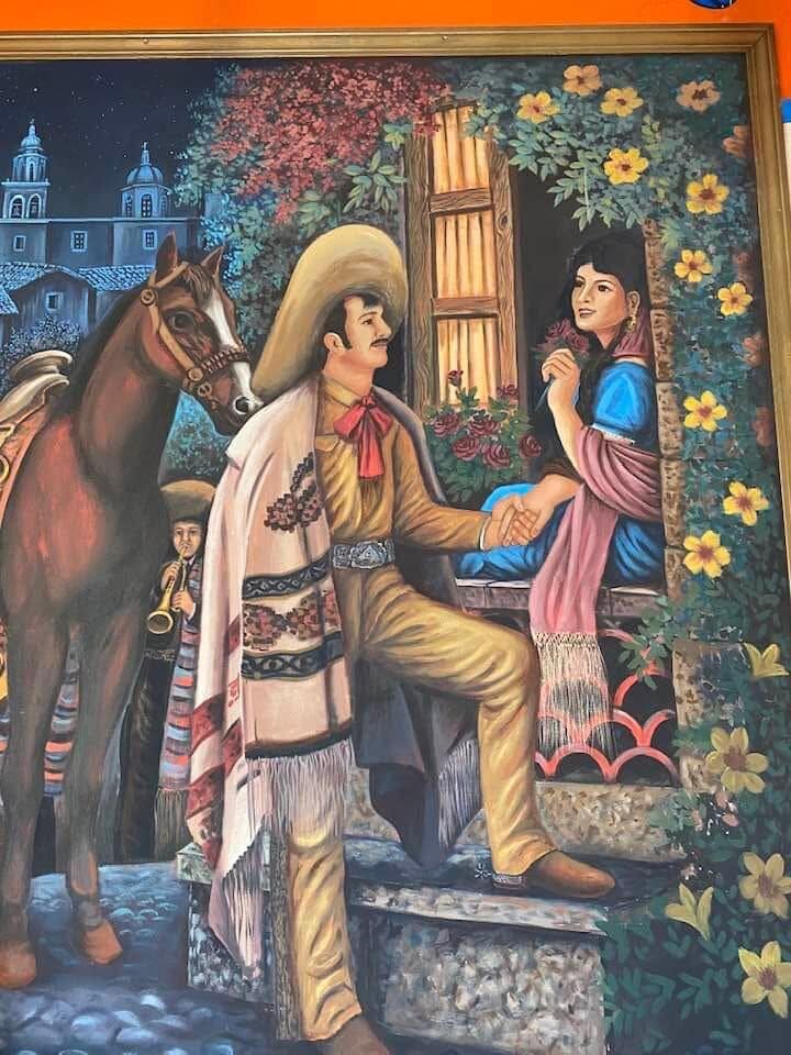 Hand-painted mural inside Fiesta Grande